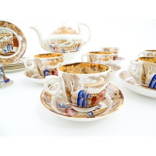 257 - A quantity of tea wares with chinoiserie decoration to include teapot, cups, saucers and plates. Tog... 