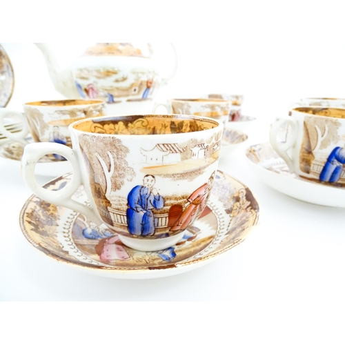 257 - A quantity of tea wares with chinoiserie decoration to include teapot, cups, saucers and plates. Tog... 