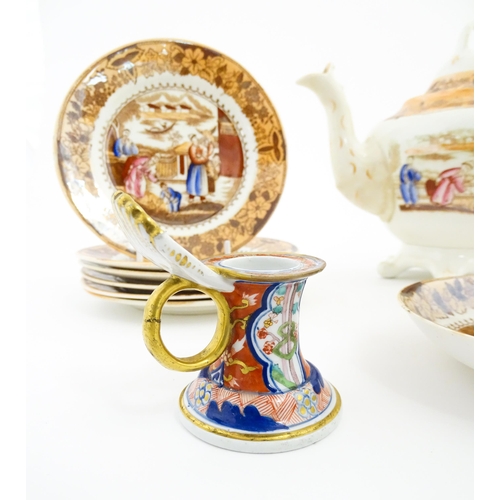 257 - A quantity of tea wares with chinoiserie decoration to include teapot, cups, saucers and plates. Tog... 