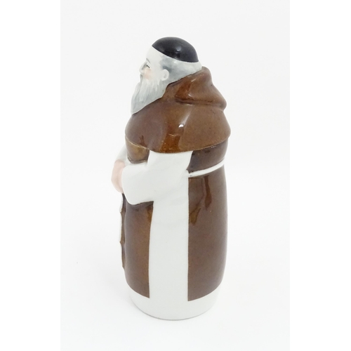 259A - A French porcelain liquor bottle / decanter modelled as a monk. Marked under France Charles Ahrenfel... 