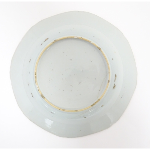 52 - A Chinese blue and white dish with floral and foliate decoration. Approx. 8 3/4