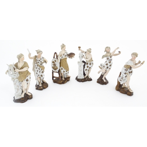 89 - A set of six porcelain figures of Muses personifying the Arts, each holding various attributes, to i... 