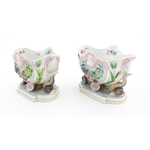 91 - A pair of Ernst Bohne Sohne vases of shaped form decorated with flowers, foliate, mask and shell det... 