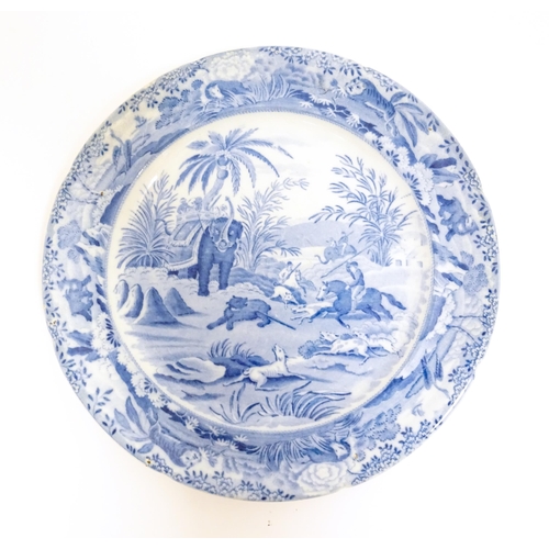 97 - An Edward Challinor blue and white plate in the Death of the Bear pattern from the Oriental Sports s... 