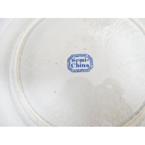 99 - A Minton blue and white plate in the Italian Ruins pattern. Marked under. Approx. 10