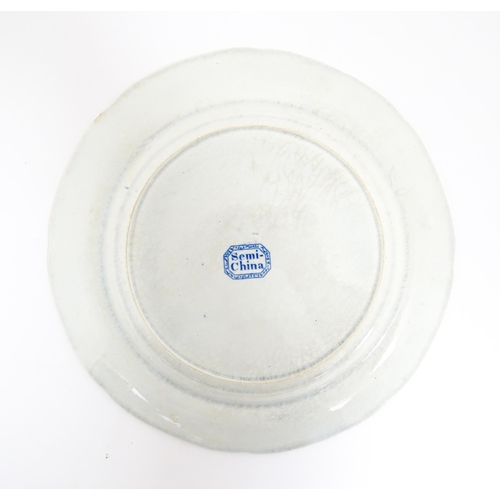 99 - A Minton blue and white plate in the Italian Ruins pattern. Marked under. Approx. 10