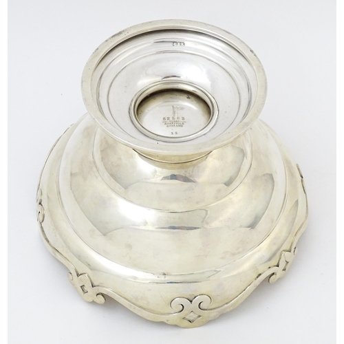 565 - A silver pedestal rose bowl hallmarked Sheffield 1911, maker Walker & Hall. Approx. 5