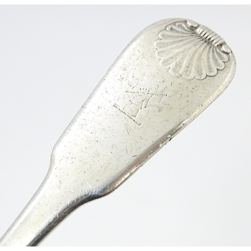 566 - A William IV Irish silver Fiddle & Shell pattern ladle hallmarked Dublin 1834, maker Philip Weekes. ... 