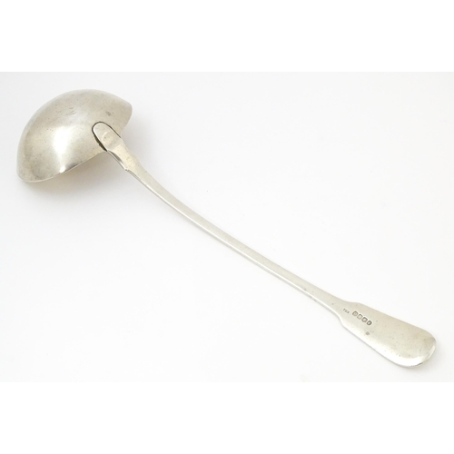 566 - A William IV Irish silver Fiddle & Shell pattern ladle hallmarked Dublin 1834, maker Philip Weekes. ... 