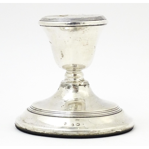 567 - A squat silver candlestick hallmarked Birmingham 1918, Williams (Birmingham) Ltd. Approx. 3