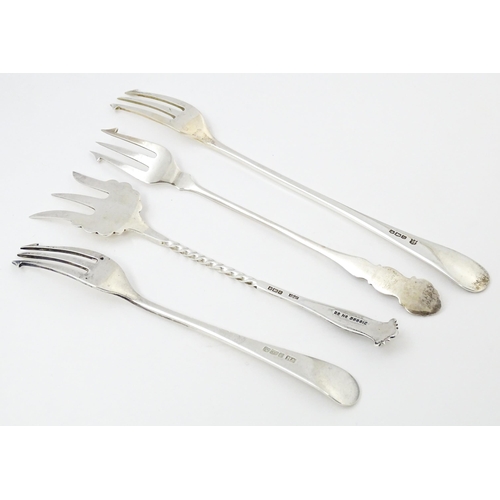 572 - Four assorted silver forks to include three pickle forks, hallmarks to include Birmingham 1901, Shef... 