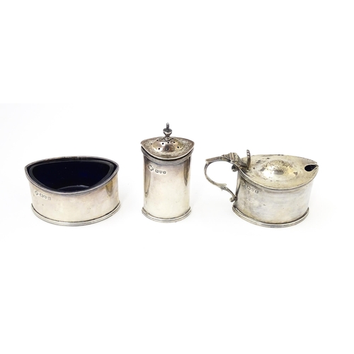 573 - A silver three piece cruet comprising salt, pepper and mustard pot, hallmarked Chester 1924/25 maker... 