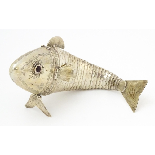 576 - A Continental .830 silver novelty spice box formed as an articulated fish. Stamped 830, probably Sca... 