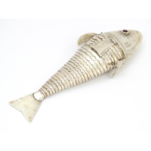 576 - A Continental .830 silver novelty spice box formed as an articulated fish. Stamped 830, probably Sca... 