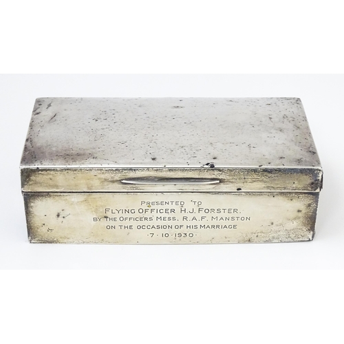 579 - A silver cigarette box with engraving to side relating to Flying Officer H. J. Forster, RAF Manston,... 