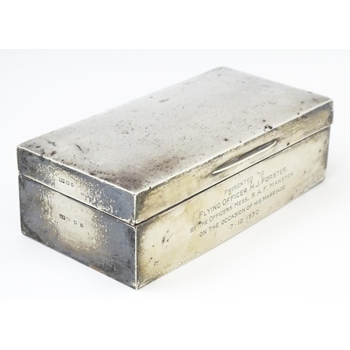 579 - A silver cigarette box with engraving to side relating to Flying Officer H. J. Forster, RAF Manston,... 