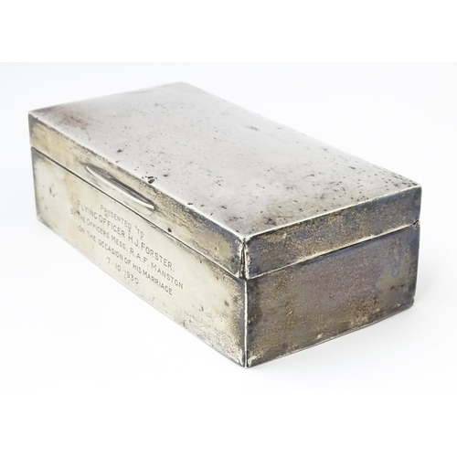 579 - A silver cigarette box with engraving to side relating to Flying Officer H. J. Forster, RAF Manston,... 