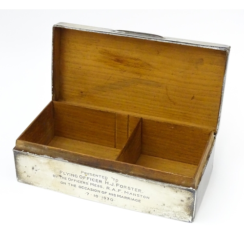 579 - A silver cigarette box with engraving to side relating to Flying Officer H. J. Forster, RAF Manston,... 