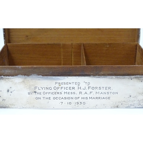 579 - A silver cigarette box with engraving to side relating to Flying Officer H. J. Forster, RAF Manston,... 