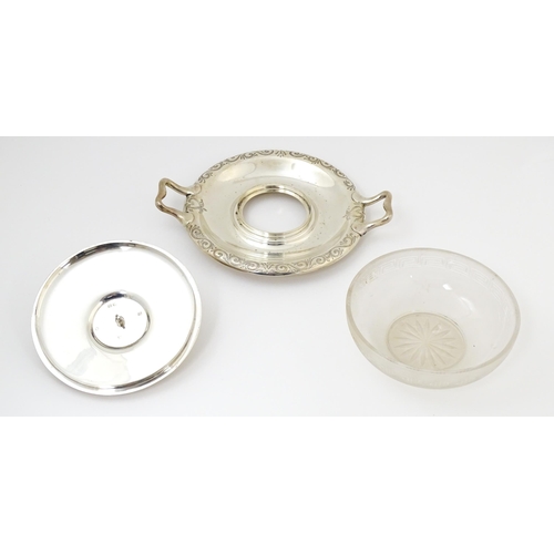 582 - A Victorian butter dish formed from a glass bowl with Greek Key decoration with a twin handled silve... 