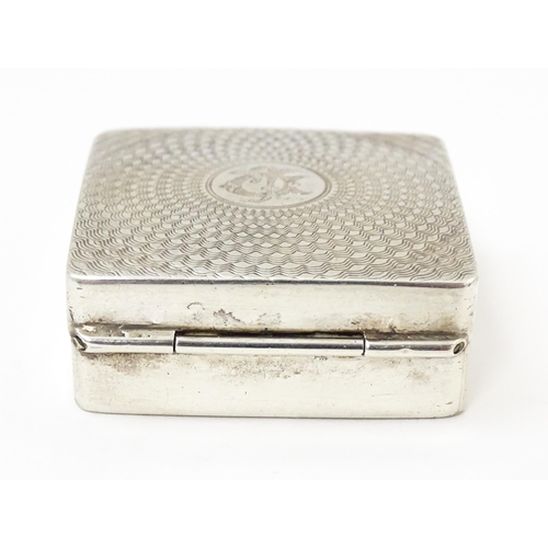 598 - A silver box / compact of squared form with engine turned decoration and gilded interior, hallmarked... 