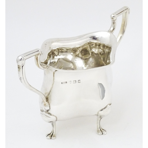 600 - An Art Nouveau silver twin handled sugar bowl, hallmarked Birmingham 1908, maker E. S Barnsley & Co.... 