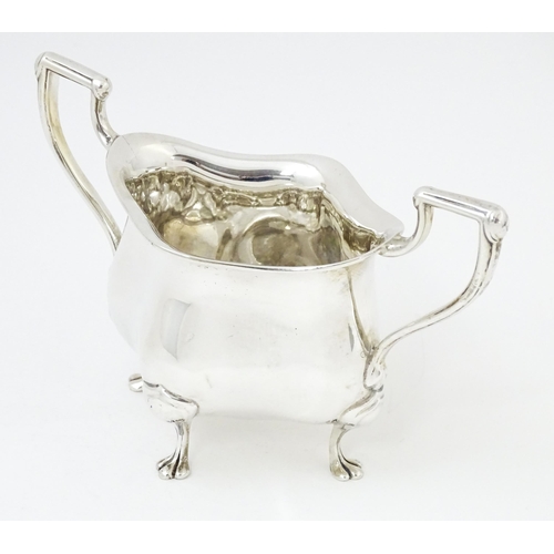 600 - An Art Nouveau silver twin handled sugar bowl, hallmarked Birmingham 1908, maker E. S Barnsley & Co.... 