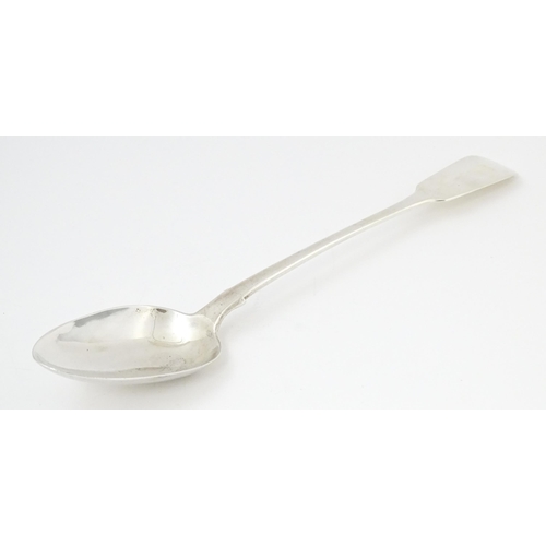 609 - A William IV silver Fiddle pattern basting / stuffing spoon hallmarked London 1832, maker Robert Hen... 