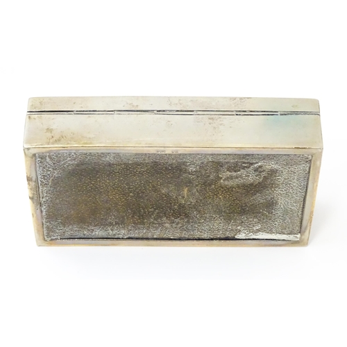 610 - Scandinavian silver: A .830 silver cigarette box stamped HG. Approx. 5