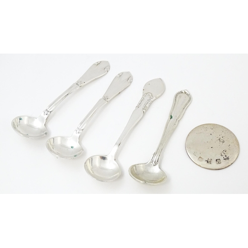 611 - Four various silver / white metal / silver plate salt spoons to include a Danish silver example date... 