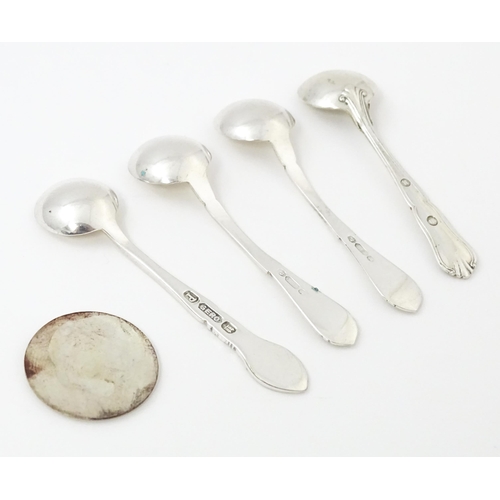 611 - Four various silver / white metal / silver plate salt spoons to include a Danish silver example date... 