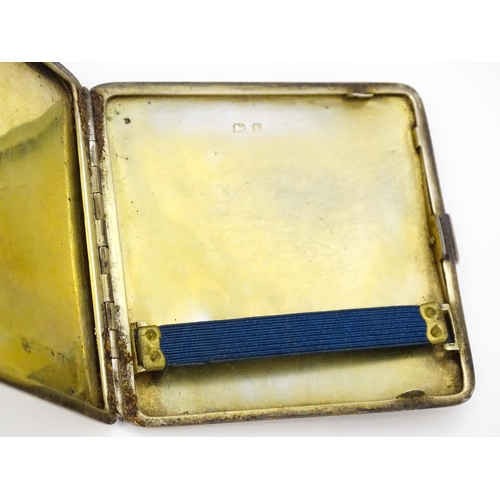 620 - An Art Deco silver cigarette case with engine turned decoration hallmarked Birmingham 1929, maker Ma... 