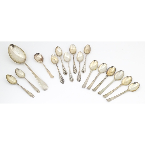 621 - Assorted silver and silver plate spoons to include a silver tablespoon hallmarked Sheffield 1932, ma... 