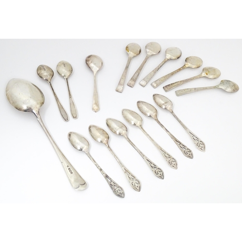 621 - Assorted silver and silver plate spoons to include a silver tablespoon hallmarked Sheffield 1932, ma... 