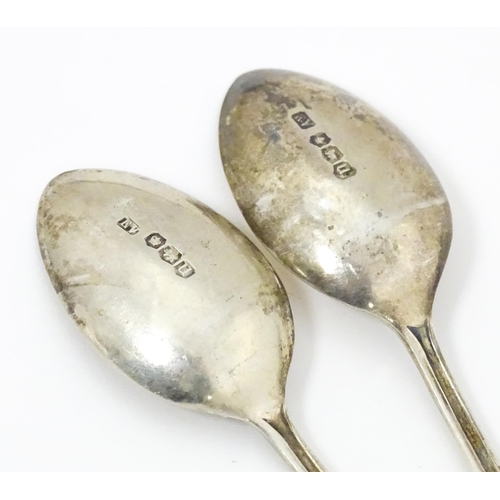 621 - Assorted silver and silver plate spoons to include a silver tablespoon hallmarked Sheffield 1932, ma... 