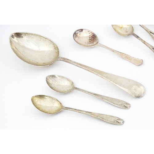 621 - Assorted silver and silver plate spoons to include a silver tablespoon hallmarked Sheffield 1932, ma... 