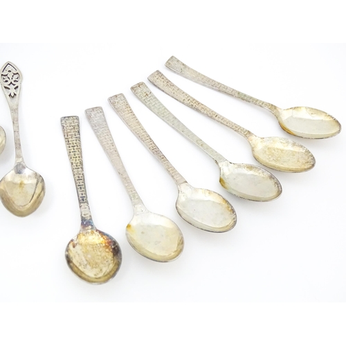 621 - Assorted silver and silver plate spoons to include a silver tablespoon hallmarked Sheffield 1932, ma... 