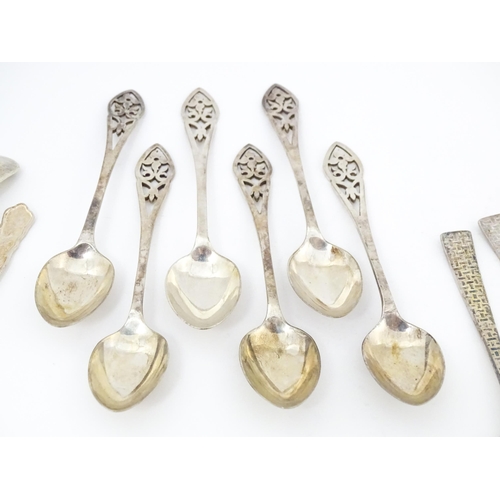 621 - Assorted silver and silver plate spoons to include a silver tablespoon hallmarked Sheffield 1932, ma... 