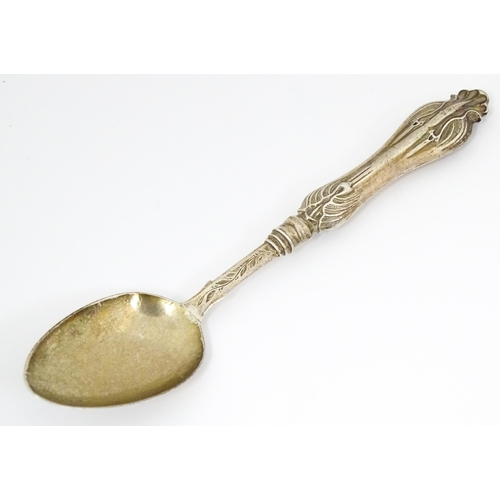 625 - A Victorian silver spoon with engraved decoration, hallmarked Birmingham 1853, maker George Unite. A... 