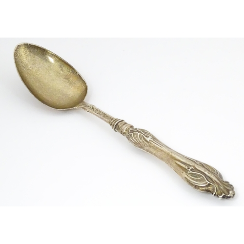 625 - A Victorian silver spoon with engraved decoration, hallmarked Birmingham 1853, maker George Unite. A... 