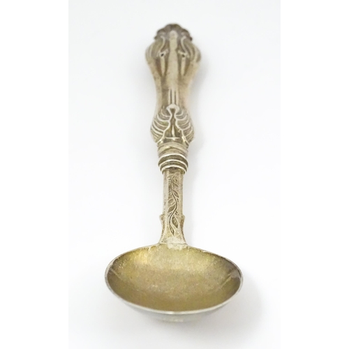 625 - A Victorian silver spoon with engraved decoration, hallmarked Birmingham 1853, maker George Unite. A... 