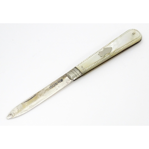 636 - A silver folding fruit knife with mother of pearl handle hallmarked Sheffield 1908, maker John Yeoma... 