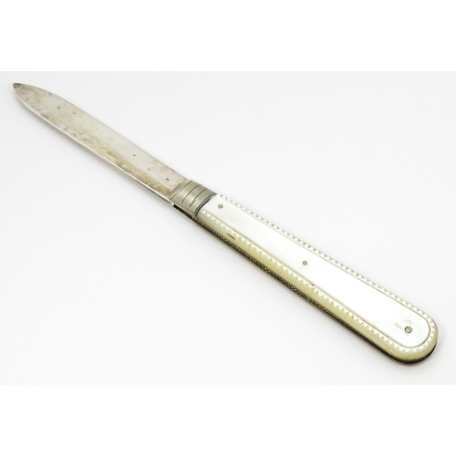 636 - A silver folding fruit knife with mother of pearl handle hallmarked Sheffield 1908, maker John Yeoma... 