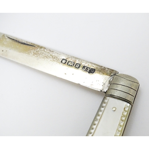 636 - A silver folding fruit knife with mother of pearl handle hallmarked Sheffield 1908, maker John Yeoma... 