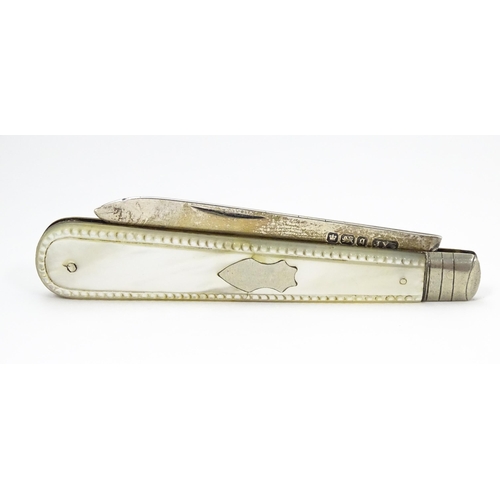 636 - A silver folding fruit knife with mother of pearl handle hallmarked Sheffield 1908, maker John Yeoma... 