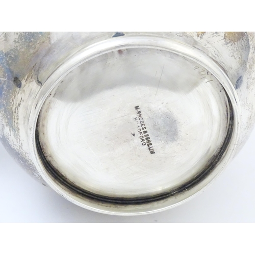 651 - A silver coffee / hot water pot hallmarked London 1909, maker Ackroyd Rhodes; Manoah Rhodes & Sons L... 