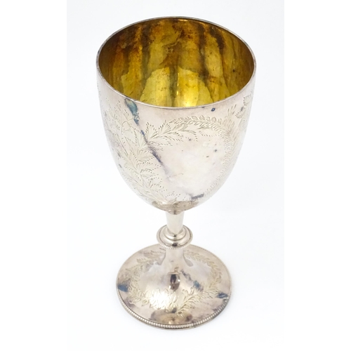 655 - A Victorian silver goblet with engraved fern decoration and gilded interior, hallmarked London 1878,... 