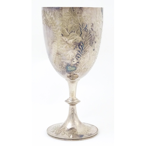 655 - A Victorian silver goblet with engraved fern decoration and gilded interior, hallmarked London 1878,... 