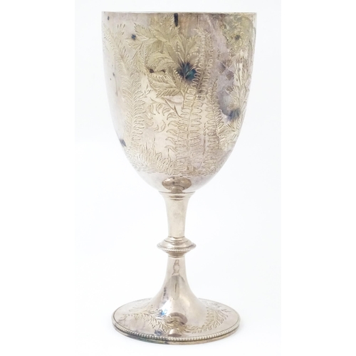 655 - A Victorian silver goblet with engraved fern decoration and gilded interior, hallmarked London 1878,... 