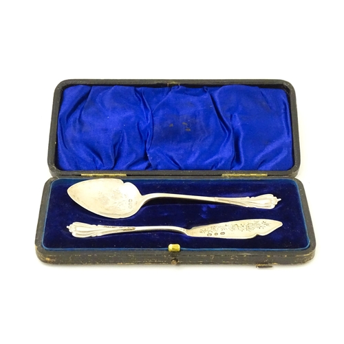 673 - A Victorian silver butter knife and preserve spoon hallmarked Birmingham 1895, maker Joseph Gloster.... 